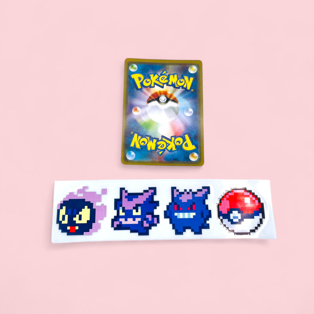 Gastly Haunter Gengar Evolution 8Bit Retro Pixel Vinyl Sticker next to Pokemon card