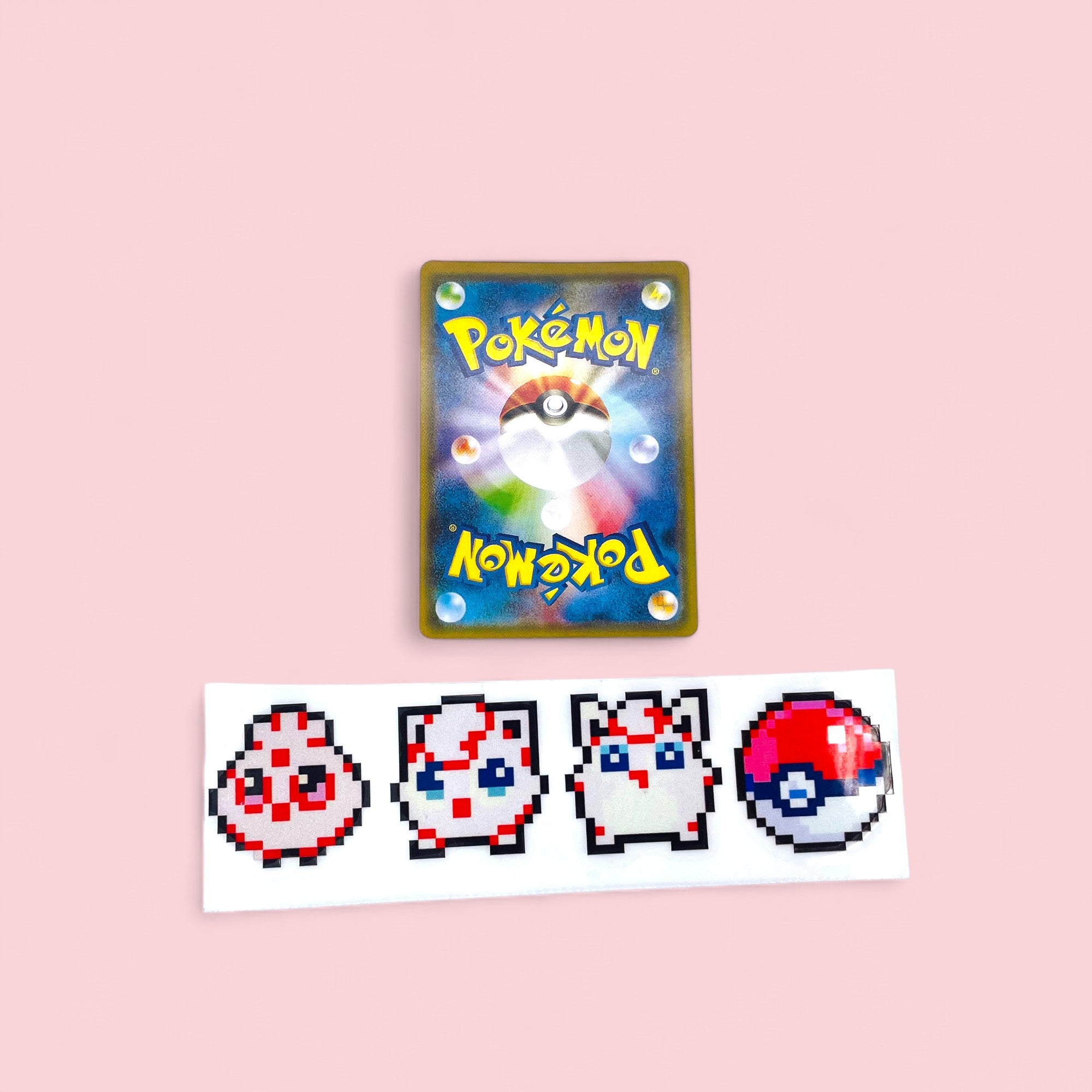 Jigglytuff Wigglytuff Evolution 8Bit Retro Vinyl Sticker next to Pokemon card