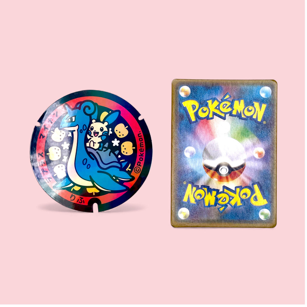 Lapras Poke-Lid Holographic Stickers Japan Minun Kawaii Decal next to Pokemon card