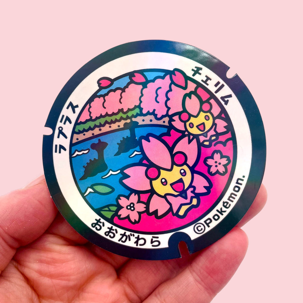 Large Lapras & Sunshine Cherrim Poke-Lid Sticker (Ogawara, Japan) in Hand