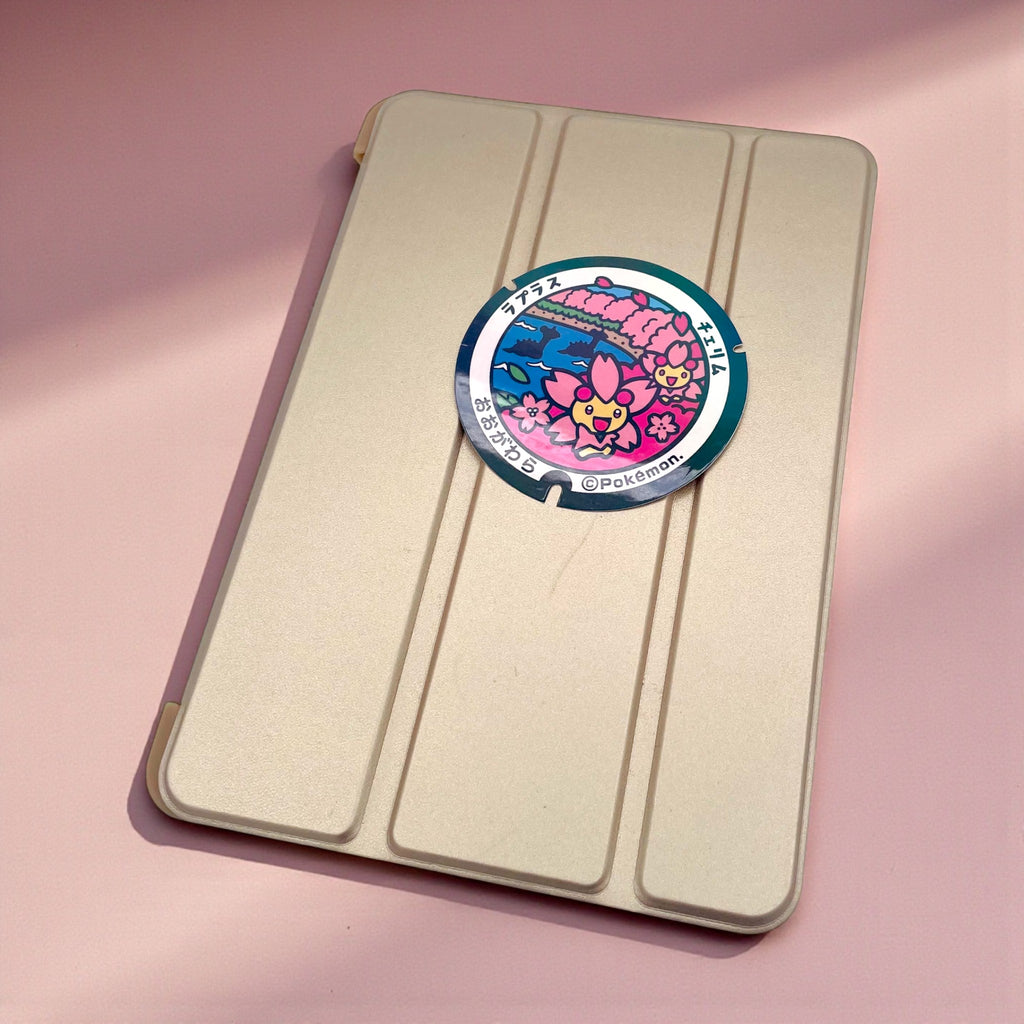 Large Lapras & Sunshine Cherrim Poke-Lid Sticker (Ogawara, Japan) on iPad Tablet