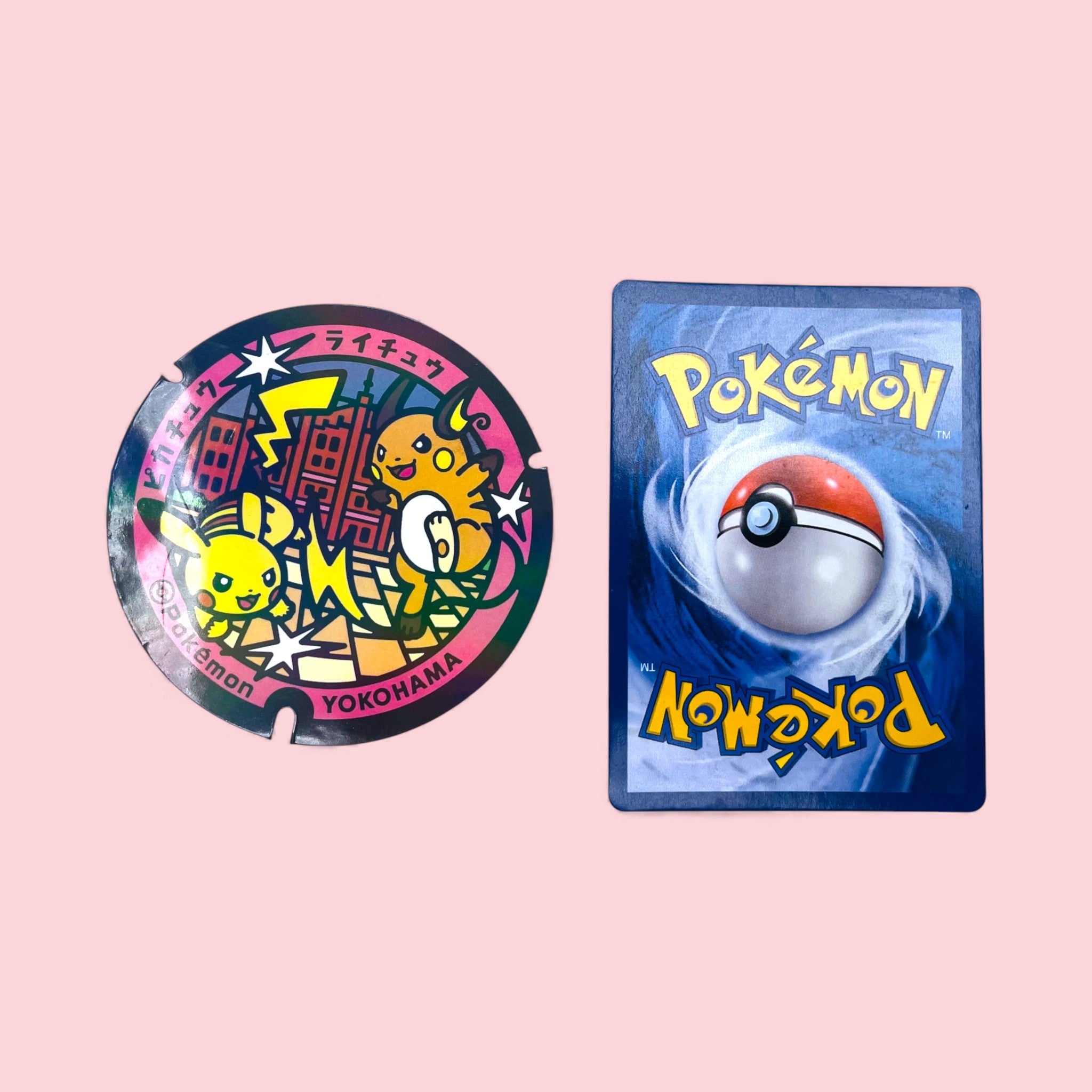 Pikachu & Raichu Poke-Lid Sticker Yokohama Japan Vinyl Sticker beside Pokemon card