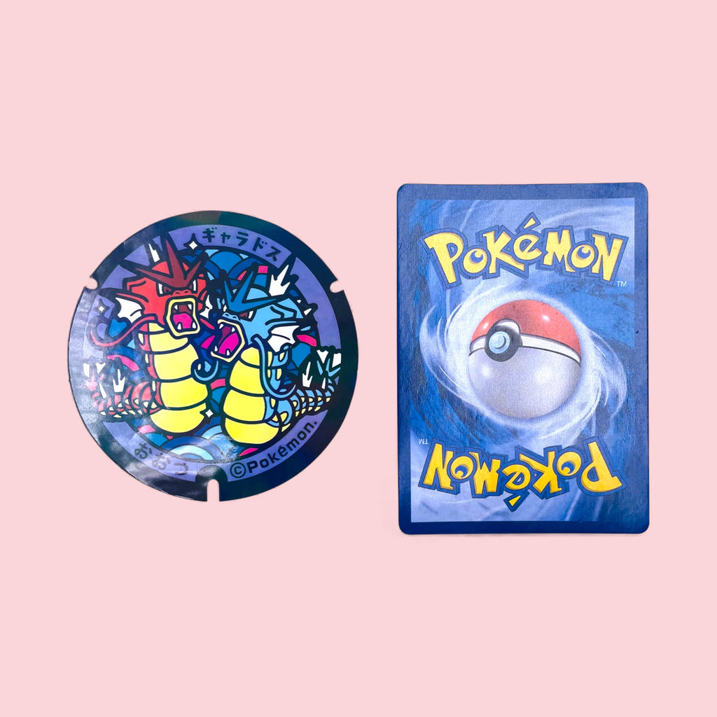 Red Gyarados & Gyarados Poke-Lid Sticker Otsu Japan Premium Gamer Decal next to Pokemon card