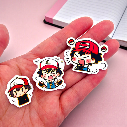 Close up of Ash Ketchum chibi trainer stickers with expressive moods