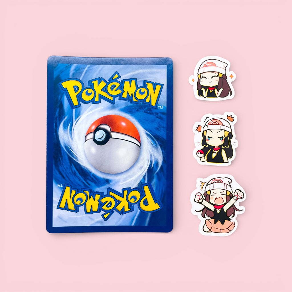 Dawn chibi trainer stickers decorating a photocard toploader