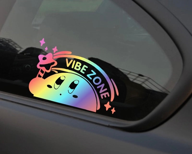 Kirby holographic vinyl sticker applied to car window exterior