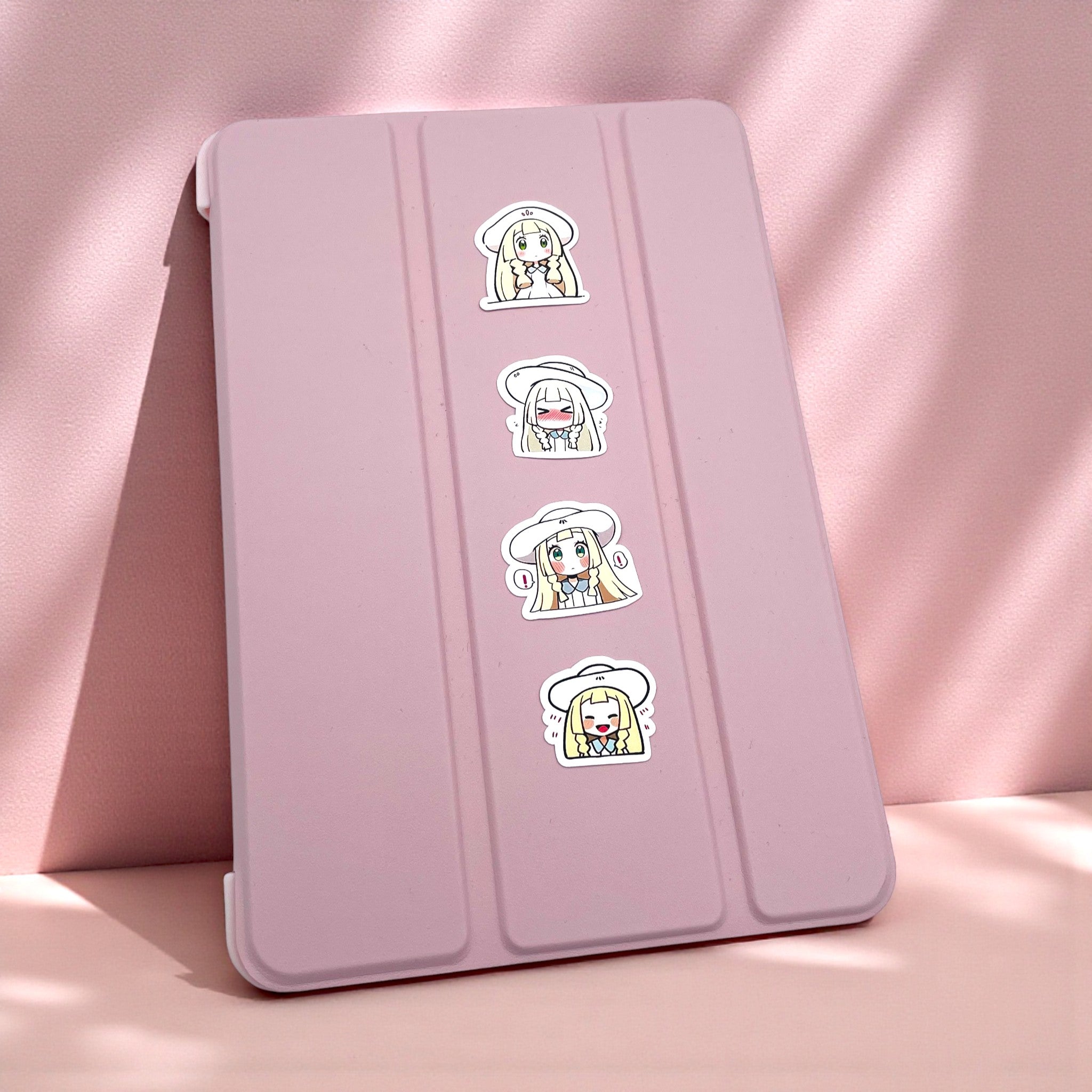 40 Lillie chibi trainer mood stickers arranged on a tablet