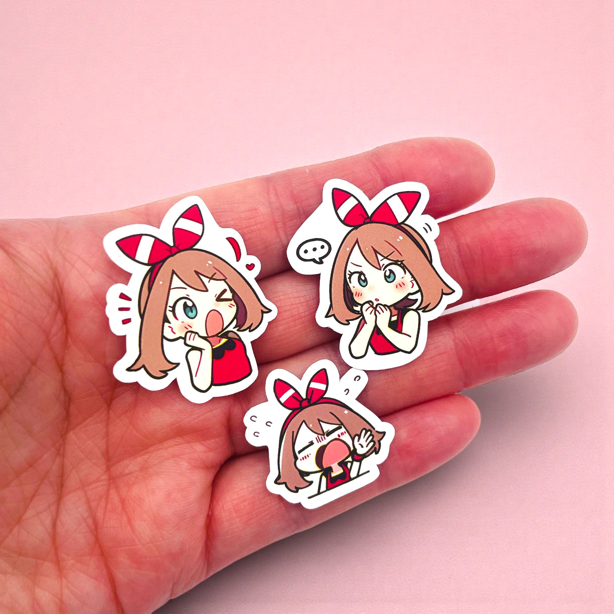 Close up of May chibi trainer stickers with expressive anime moods
