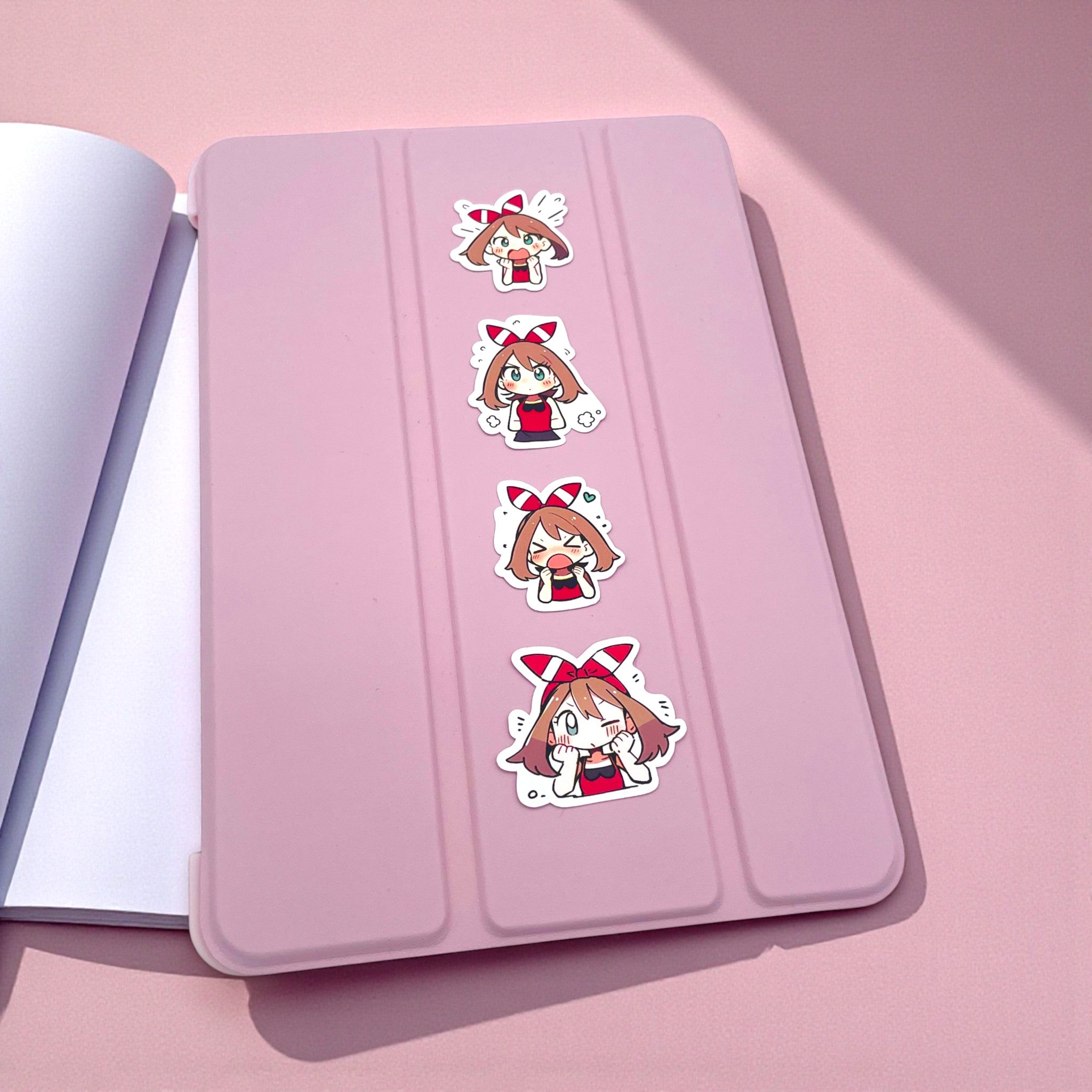 May chibi trainer stickers decorating a tablet