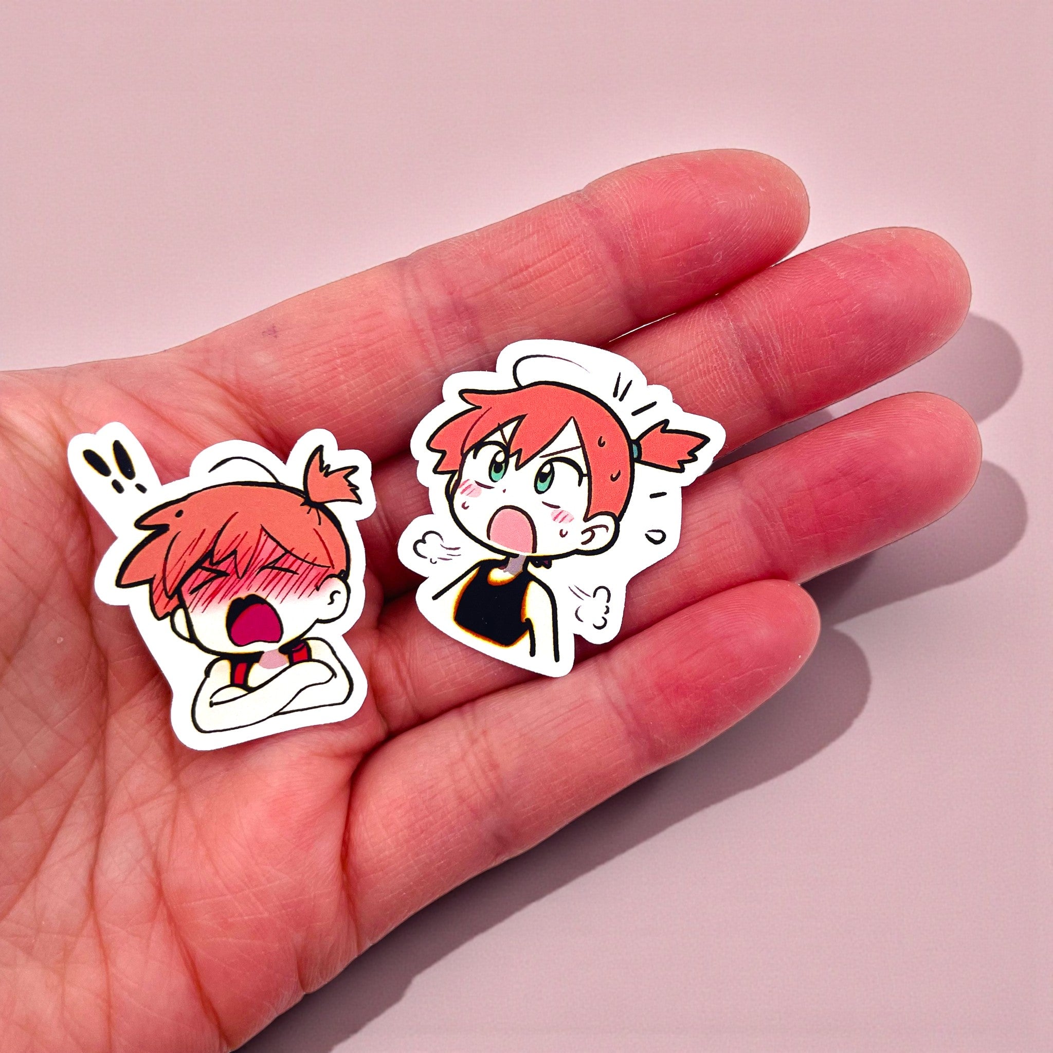Close up of Misty chibi trainer stickers with expressive anime moods