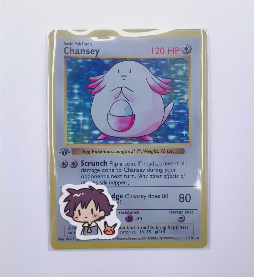 Ash Ketchum chibi trainer stickers decorating a photocard toploader