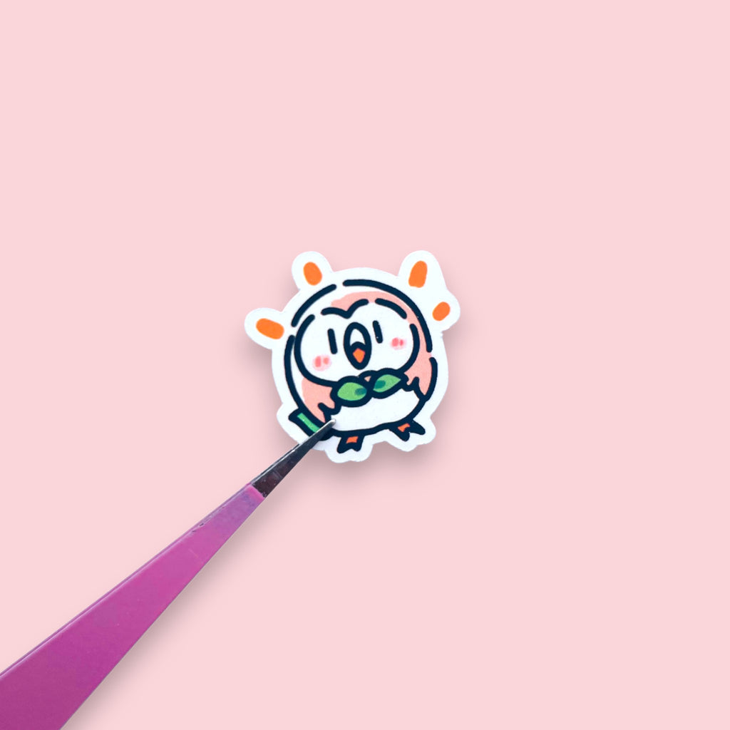 Close up of Rowlet chibi mini owl stickers with expressive pastel moods